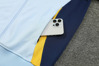 CONJUNTO DE VIAJE REAL MADRID 24/25 HOMBRE - Vitrine Futebolística